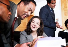 Photo of people working together